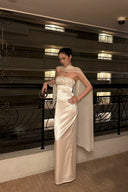Vogsion Celeste Ivory Satin Cape Gown – back/side view showing trailing cape drape over shoulders
