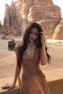 Vogsion Spring Oath Embroidered Tulle Gown in champagne nude featuring floral corset bodice and flowing pleated tulle skirt, styled for destination wedding and evening gala elegance