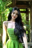 Vogsion Lime Green Maxi Dress for Women 2026 Summer - Real customer wearing flowy spaghetti strap crisscross backless satin vacation beach sundress in tropical garden, not professional model photos