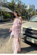 Vogsion Luna Fanned Maxi Dress in Spliced Floral worn by normal customer not professional model | Spring 2026 Kindred Spirit Collection tiered ruffle halter maxi dress in yellow/pink – perfect boho wedding guest look