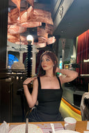 Vogsion black square-neck corset draped mini dress — customer photo by window full-body