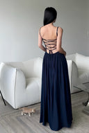 Vogsion Midnight Siren Navy Blue Maxi Dress with notched neckline, ruched bodice, high leg slit, and criss-cross lace-up open back.