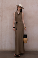 Back view of cowl neck halter dress showing twisted strap detail and slim silhouette