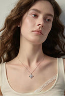 Model wear Vogsion Fleur d’Iris CZ pendant necklace- silver tone