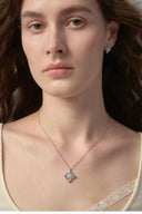 Model wear Vogsion Fleur d’Iris CZ pendant necklace