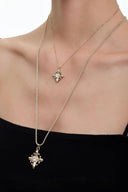 Model wear Vogsion Fleur d’Iris CZ pendant necklace