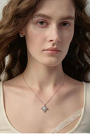 Model wear Vogsion Fleur d’Iris CZ pendant necklace