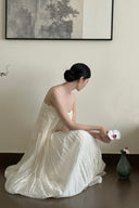 Side profile of petite lined white maxi dress for summer