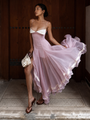 The Vogsion Liane petite wedding guest organza ruffle midi dress in blush pink with high-low hem