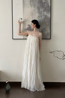 VOGSION Éloise Petite Lace Crinkle Maxi Dress front view with adjustable straps