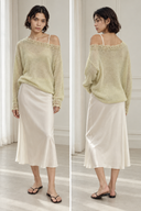 Light green oversized wool-blend sweater, front and back views with crochet-trim boat neckline.