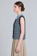 Fair Isle button knit vest in midnight blue and sky blue, side view