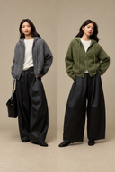 Full-length side-by-side styling: Grey hooded cardigan on the left and Sage Green on the right, both with black wide-leg trousers.