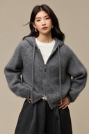Front view of the Grey wool, mulberry silk and cashmere hooded cardigan with a two-way zip and ribbed trims.