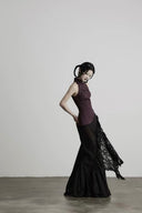 Side silhouette of the Noctara black lace charm maxi skirt with layered asymmetrical panels