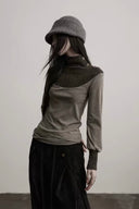 Indulge Ravena taupe and charcoal wool-knit long-sleeve top, three-quarter model view