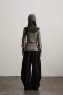 Indulge Ravena wool-knit long-sleeve top, back view showing the charcoal yoke