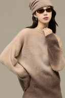 Latte-to-mocha gradient knit sweater showing relaxed oversized fit