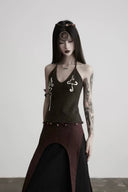Close front view of the dark brown wool knit halter top with white serpent embroidery and fixed beaded hem
