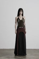 Full-length styling of the Naga dark brown gothic wool knit halter top with a long skirt