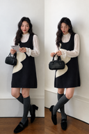 Two styled views of the navy and ivory wave knit mini dress