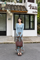 Petite light blue V-neck cardigan styled with a long floral skirt