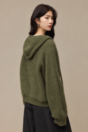 Back view of the Sage Green hooded knit cardigan with raglan sleeves, a relaxed silhouette and ribbed hem.