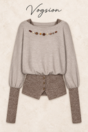 Front flat lay of a taupe cotton knit top with a beaded neckline, contrast long cuffs and three-button split hem.