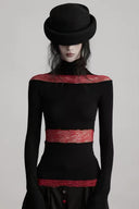 Front view of a fitted black Gothic lace top with burgundy shoulder, waist, hem and cuff panels