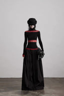 Full-length outfit view highlighting the black and burgundy lace top; pants, hat and bag not included