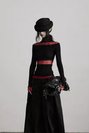 Black and burgundy Gothic lace top styled with wide-leg pants, hat and bag; accessories and bottoms not included
