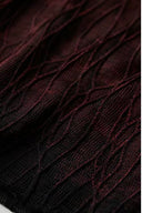 Macro detail of the black mesh with dark red textured lines