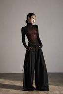 Full-length styling view of the regular black and red sheer gothic mesh top