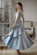 VOGSION Adagio dusty blue satin midi dress, back zipper and ruffle skirt view