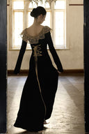 Black floor-length lace-trim corset maxi dress shown from the back with long tie detail