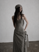 Closer front view of the strapless pointed neckline and boned corset bodice