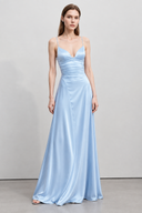 Front view of Avelise light blue maxi dress with adjustable straps and ruched waist
