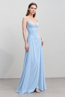 Side view of Avelise light blue evening dress with a flowing full-length skirt