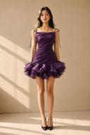 Full-length front view of the purple petal ruffle mini dress