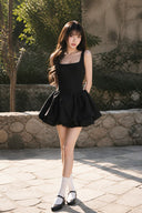 VOGSION black sleeveless square-neck bubble mini dress, front view