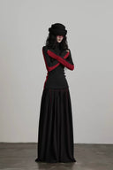 VOGSION Bloodline black and red Gothic sweater styled with a black maxi skirt