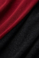 Black and deep red wool-blend knit fabric texture detail