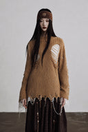 Close front view of camel ribbed distressed knit sweater with crew neck