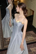 Waist-defining glitter bodice on the VOGSION Celestial Mirror A-line prom dress