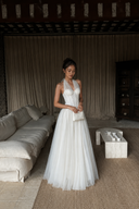Vogsion Elara Petite Ivory Tulle Halter Corset Maxi Dress front view on real customer, raised waist white fairy gown for short women