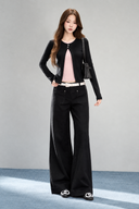 VOGSION Elina black petite faux-layer long sleeve top with pink inset, front full-length model view