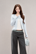 VOGSION Elina powder blue petite long sleeve top, close model view of round neckline and layered front