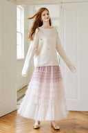 Model wearing the VOGSION Elowenne purple ombre tiered tulle maxi skirt
