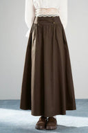 VOGSION Elowyn dark brown cotton petite maxi skirt with gathered A-line silhouette and decorative waist buttons