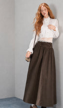 VOGSION Elowyn white cotton ruffle blouse and dark brown petite maxi skirt set styled with a shoulder bag